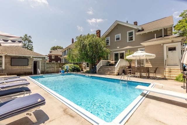 94 Circuit Rd, Winthrop, MA 02152 - view of pool with a diving board, a patio area, a deck, and entry steps