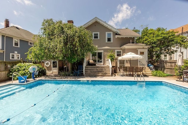 94 Circuit Rd, Winthrop, MA 02152 - view of swimming pool featuring a deck and outdoor dining space
