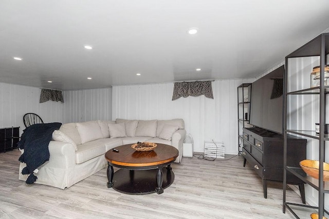 94 Circuit Rd, Winthrop, MA 02152 - living room featuring light wood-type flooring and a decorative wall
