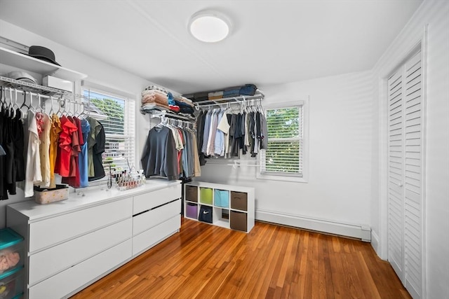 8 Nicholl St, Quincy, MA 02169 - spacious closet with baseboard heating and wood finished floors