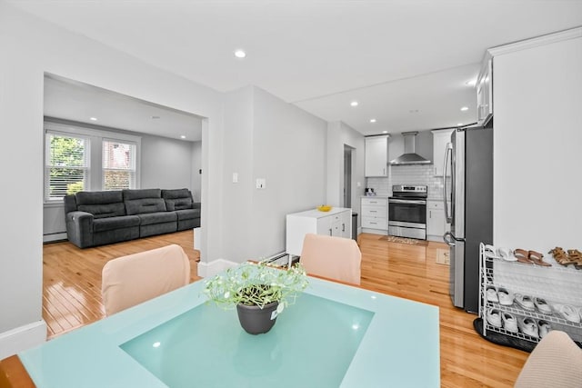 8 Nicholl St, Quincy, MA 02169 - dining area featuring light wood-type flooring, a baseboard heating unit, and recessed lighting