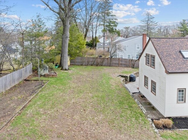 view of yard featuring a fenced backyard