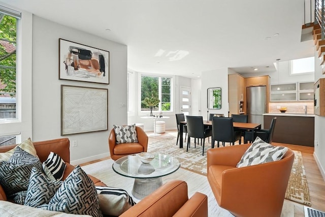95 Kirkland St Unit 95, Cambridge, MA 02138 - living area with light wood-style floors and baseboards