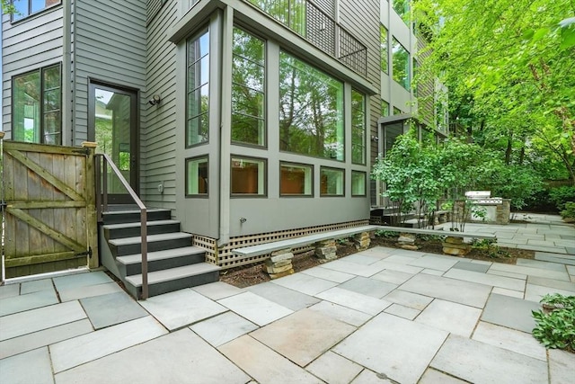95 Kirkland St Unit 95, Cambridge, MA 02138 - view of property exterior with a patio area