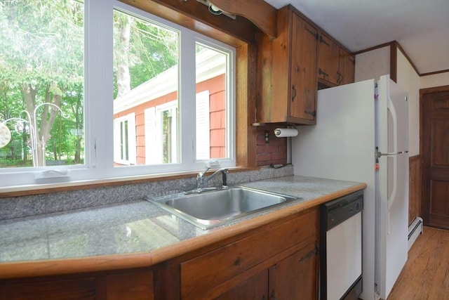 241 Fisher St, Walpole, MA 02081 - kitchen with dishwasher, a baseboard heating unit, brown cabinets, light countertops, and plenty of natural light