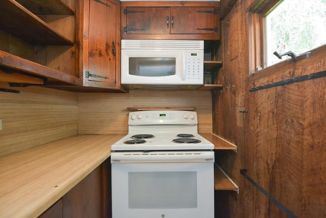 241 Fisher St, Walpole, MA 02081 - kitchen with white appliances, open shelves, brown cabinetry, and light countertops