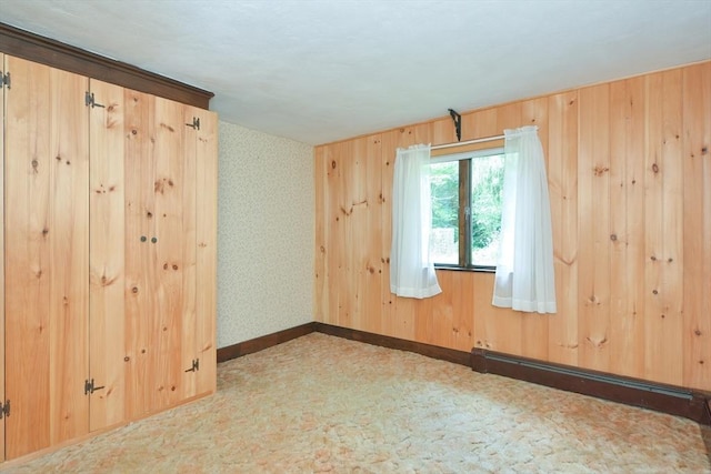 241 Fisher St, Walpole, MA 02081 - unfurnished room with a baseboard radiator and baseboards