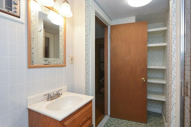 241 Fisher St, Walpole, MA 02081 - bathroom with vanity and tile walls