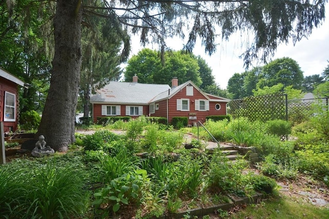 241 Fisher St, Walpole, MA 02081 - view of front of property with a chimney