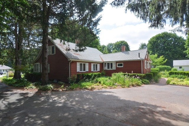 241 Fisher St, Walpole, MA 02081 - view of front of property featuring a chimney