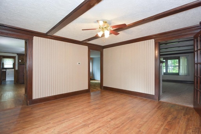 241 Fisher St, Walpole, MA 02081 - empty room with ornamental molding, a textured ceiling, wood finished floors, and ceiling fan