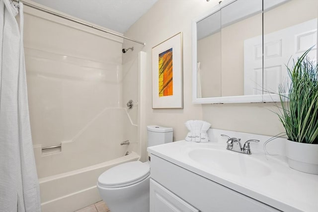 bathroom featuring shower / tub combo with curtain, toilet, vanity, and tile patterned floors