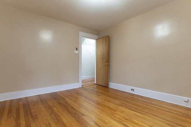 18 Balder Rd, Worcester, MA 01605 - empty room with baseboards and light wood-style flooring