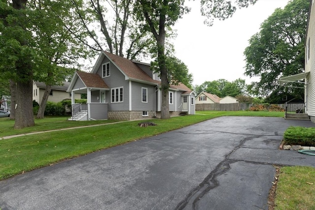 18 Balder Rd, Worcester, MA 01605 - view of front of house with roof with shingles and driveway