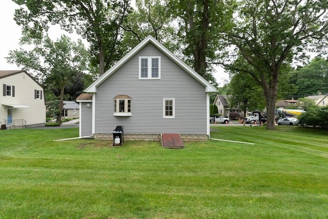 18 Balder Rd, Worcester, MA 01605 - rear view of property featuring a lawn