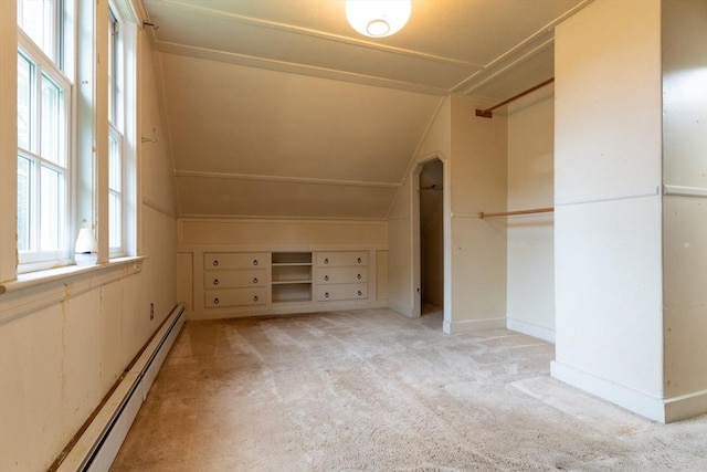 18 Balder Rd, Worcester, MA 01605 - additional living space featuring a baseboard radiator, vaulted ceiling, and light colored carpet