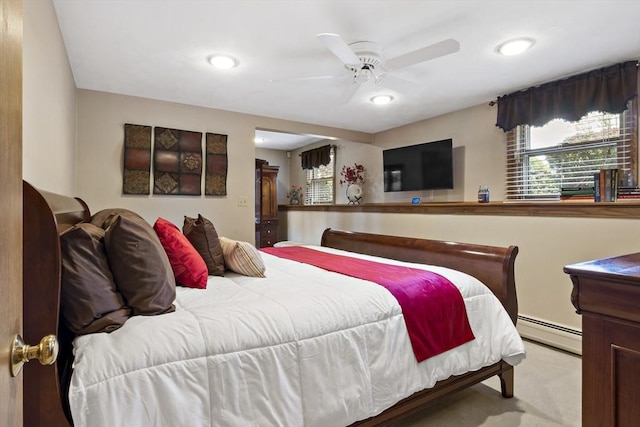bedroom featuring a baseboard heating unit, ceiling fan, recessed lighting, and light colored carpet
