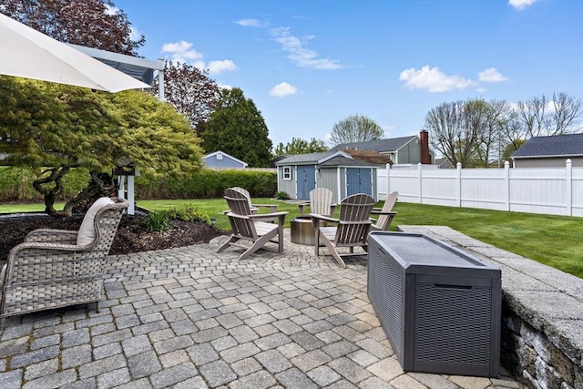 view of patio / terrace with a shed and an outdoor structure