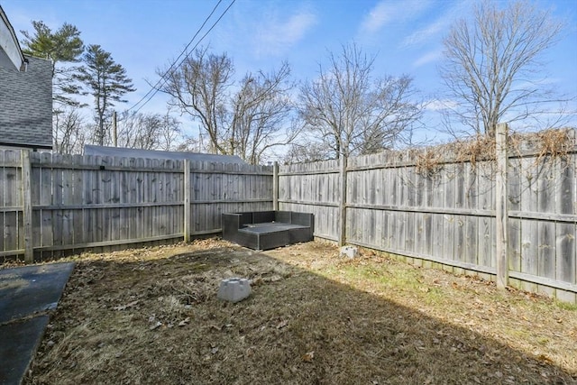 view of yard featuring a fenced backyard