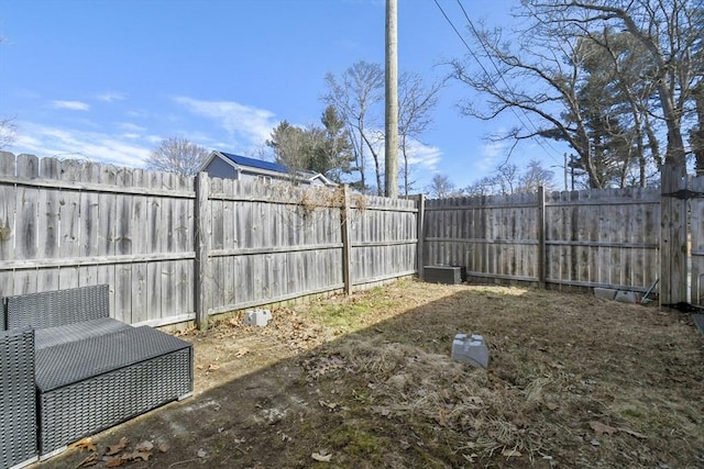 view of yard featuring a fenced backyard