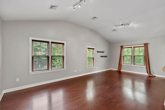 121 Green St Unit 304, Boston, MA 02130 - spare room featuring vaulted ceiling, dark wood finished floors, and rail lighting