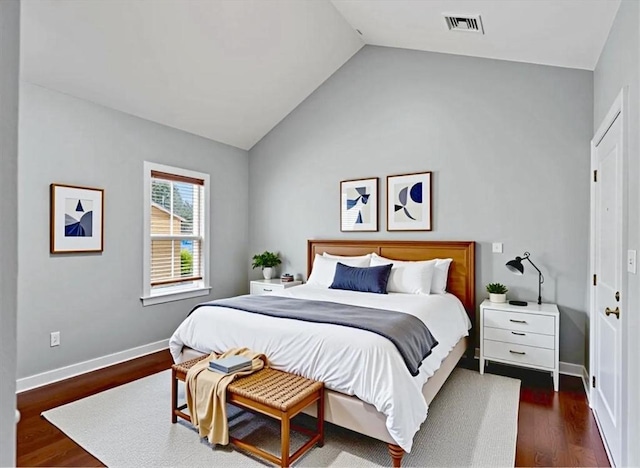 121 Green St Unit 304, Boston, MA 02130 - bedroom featuring vaulted ceiling and dark wood-style floors