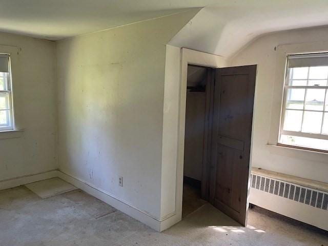 1 Pine Island Rd, Newbury, MA 01951 - unfurnished bedroom featuring radiator heating unit and lofted ceiling