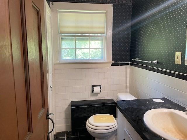 1 Pine Island Rd, Newbury, MA 01951 - bathroom with vanity, tile walls, tile patterned floors, and wallpapered walls