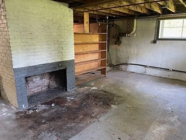 1 Pine Island Rd, Newbury, MA 01951 - basement featuring a brick fireplace