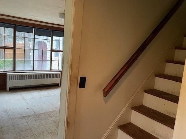 1 Pine Island Rd, Newbury, MA 01951 - stairway featuring radiator heating unit and tile patterned floors