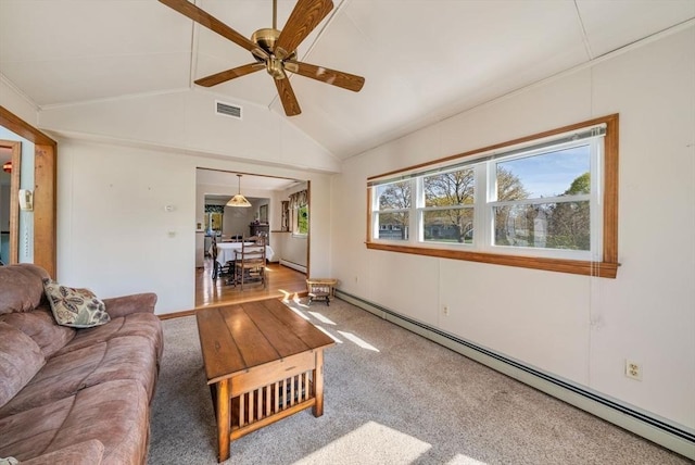 carpeted living room featuring ceiling fan, visible vents, baseboard heating, and vaulted ceiling