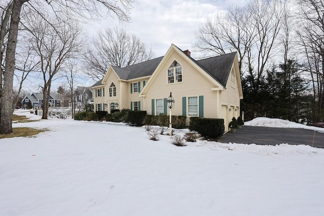 view of front of house with a chimney