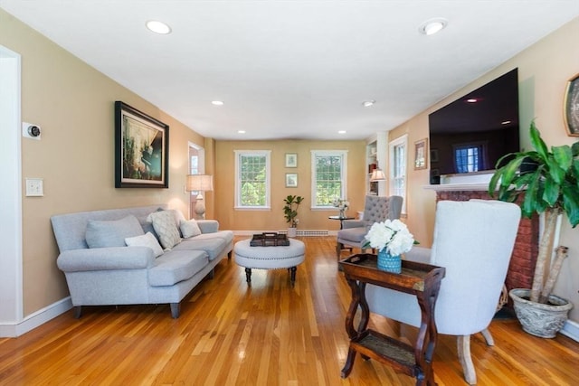 141 Morse Rd, Sudbury, MA 01776 - living room featuring light wood-type flooring and recessed lighting