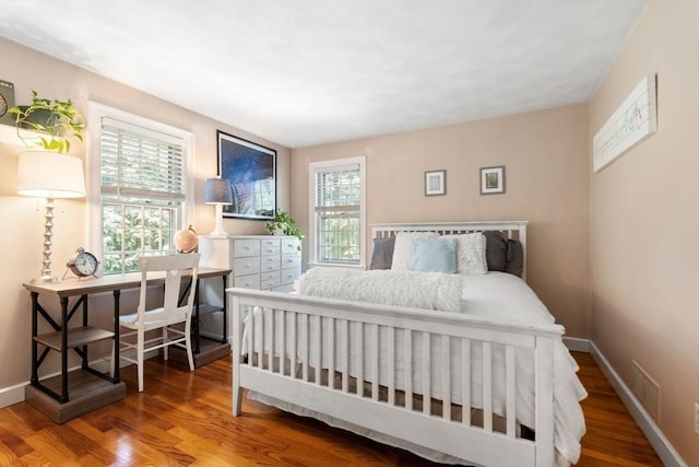 141 Morse Rd, Sudbury, MA 01776 - bedroom with wood finished floors and multiple windows