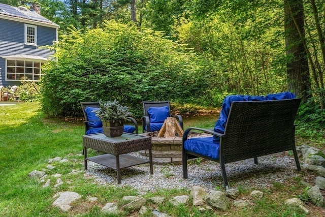 141 Morse Rd, Sudbury, MA 01776 - view of patio / terrace featuring a fire pit