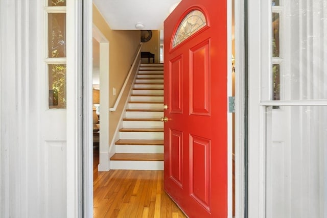 141 Morse Rd, Sudbury, MA 01776 - entrance foyer with stairway and light wood finished floors