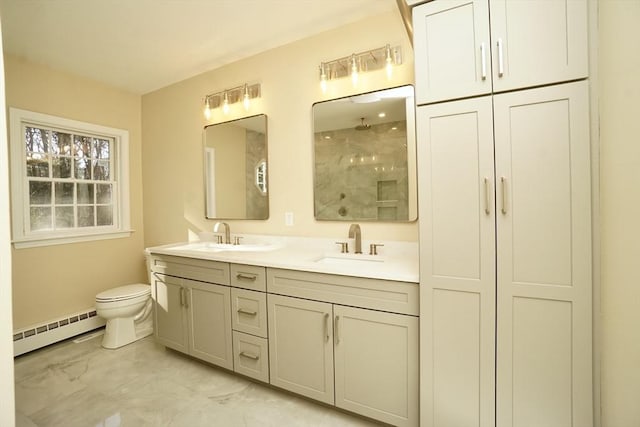 bathroom with toilet, a shower, a baseboard radiator, and vanity