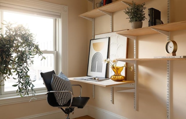 office area featuring built in desk