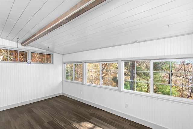 unfurnished sunroom featuring vaulted ceiling with beams