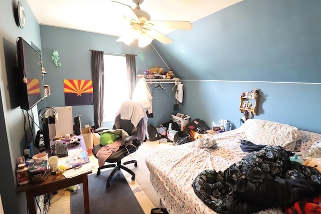 bedroom featuring lofted ceiling and ceiling fan