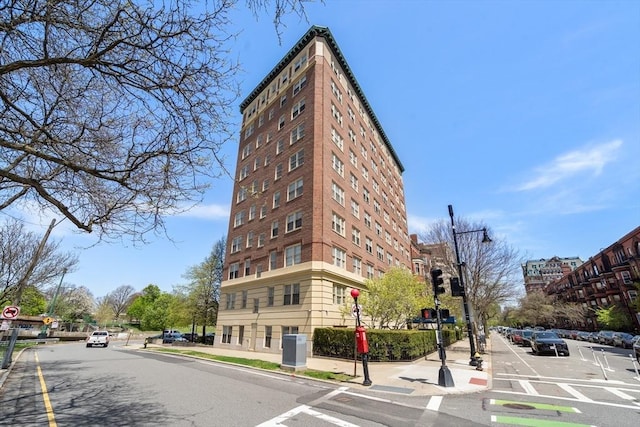 view of building exterior with central AC