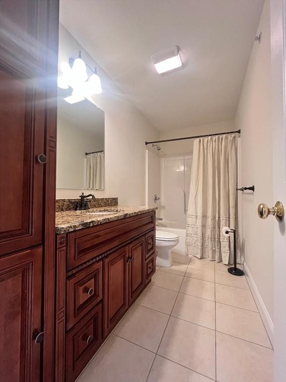 full bathroom featuring tile patterned flooring, vanity, shower / tub combo, and toilet