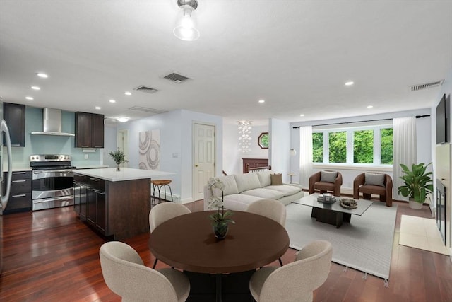 231 Totten Pond Rd, Waltham, MA 02451 - dining room featuring dark wood-style flooring, recessed lighting, and baseboards