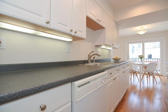 67 School St, Boston, MA 02129 - kitchen featuring dishwasher, white cabinets, dark countertops, and light wood finished floors