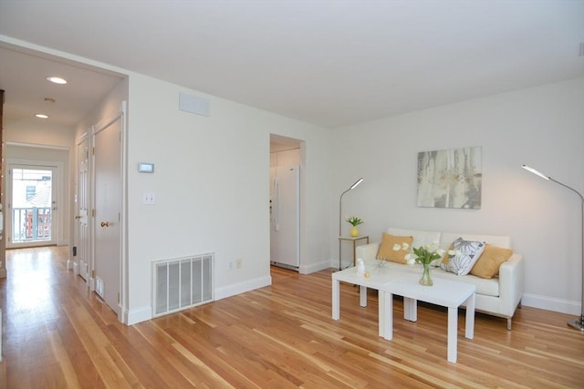 67 School St, Boston, MA 02129 - living area featuring light wood-style flooring and recessed lighting
