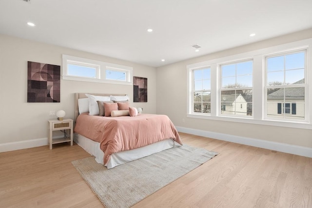 50 Hamilton Rd, Belmont, MA 02478 - bedroom featuring multiple windows, baseboards, light wood finished floors, and recessed lighting