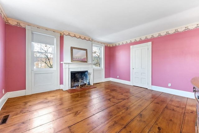 unfurnished living room featuring wood-type flooring