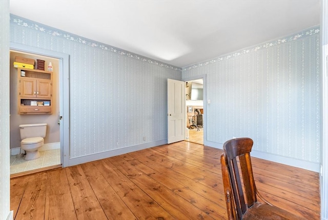 empty room with wood-type flooring