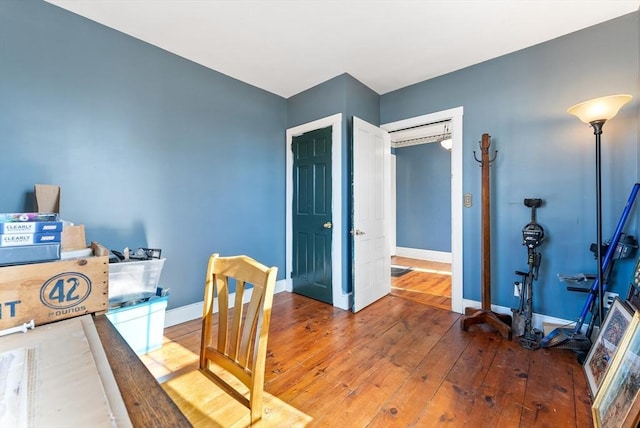 office space with hardwood / wood-style floors