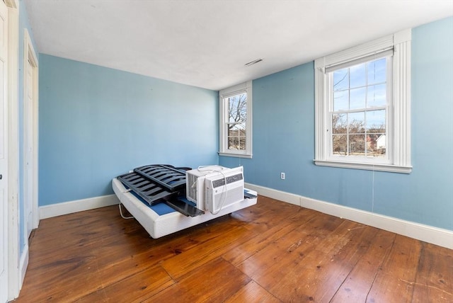 bedroom featuring wood-type flooring